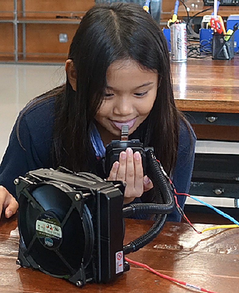 Undated handout photo issued by Professor Adrian Cheok of his daughter Kotoko Hachiya (nine) using a device called a "Taste Buddy" that emits thermal and electric signals that stimulate the taste buds. PRESS ASSOCIATION Photo. Issue date: Thursday October 13, 2016. See PA story SCIENCE Taste. Photo credit should read: Professor Adrian Cheok/PA Wire NOTE TO EDITORS: This handout photo may only be used in for editorial reporting purposes for the contemporaneous illustration of events, things or the people in the image or facts mentioned in the caption. Reuse of the picture may require further permission from the copyright holder.